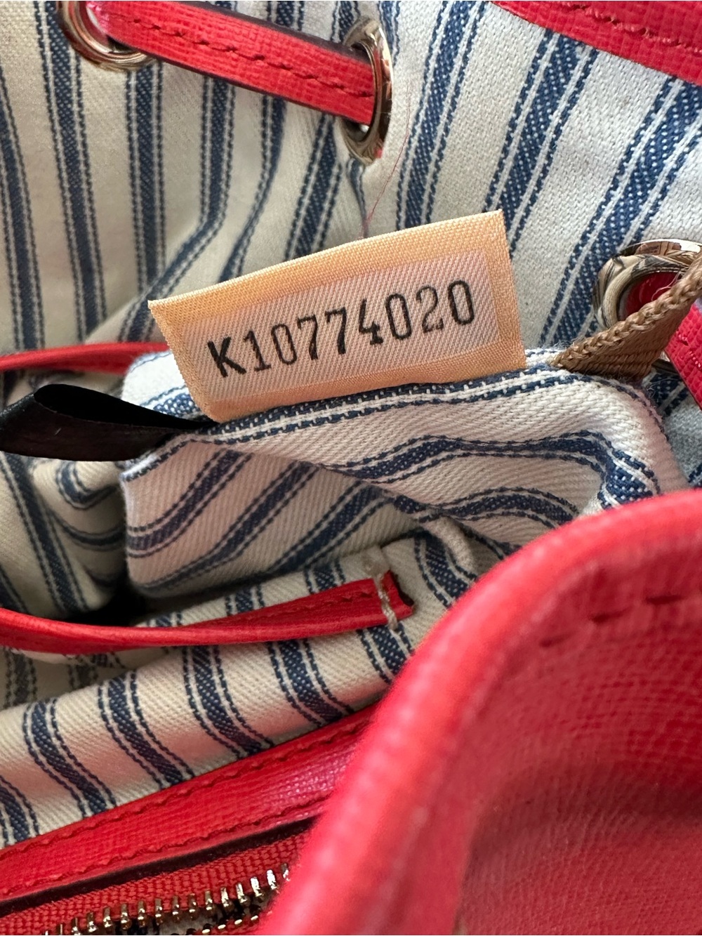 Dooney & Bourke Red/Coral Saffiano Leather Drawstring Bucket Shoulder Bag. - Picture 11 of 12
